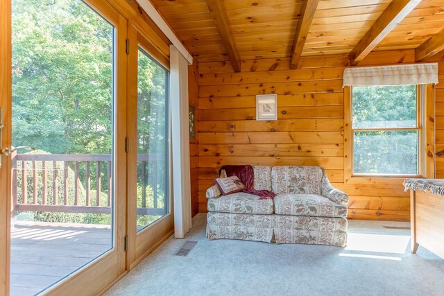 1003 Natural Chimneys Rd, Mount Solon, VA 22843 - sitting room with wooden ceiling, beam ceiling, wood walls, and carpet floors