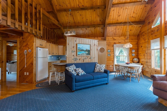 1003 Natural Chimneys Rd, Mount Solon, VA 22843 - living room featuring wood walls, high vaulted ceiling, and plenty of natural light