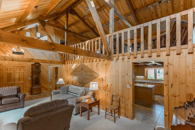 1003 Natural Chimneys Rd, Mount Solon, VA 22843 - living room with wood walls, beamed ceiling, and high vaulted ceiling