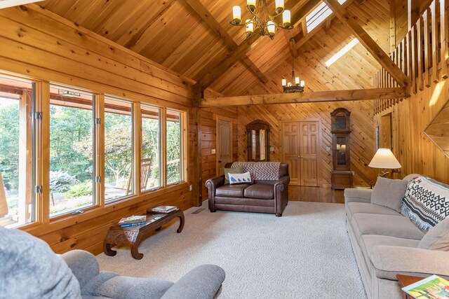 1003 Natural Chimneys Rd, Mount Solon, VA 22843 - carpeted living room featuring wood ceiling, high vaulted ceiling, a notable chandelier, beamed ceiling, and wooden walls