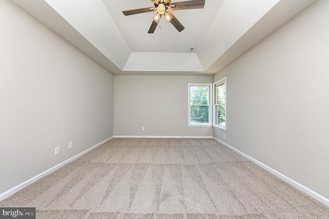 5907 Cambridge Dr, Fredericksburg, VA 22407 - spare room featuring a raised ceiling, a ceiling fan, light colored carpet, and baseboards
