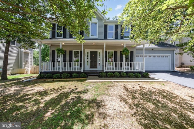 5907 Cambridge Dr, Fredericksburg, VA 22407 - colonial home with driveway, covered porch, and an attached garage