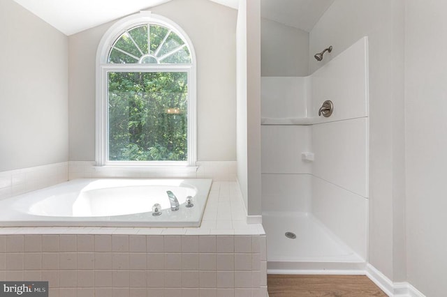 5907 Cambridge Dr, Fredericksburg, VA 22407 - full bath with vaulted ceiling, healthy amount of natural light, a bath, a shower, and wood finished floors