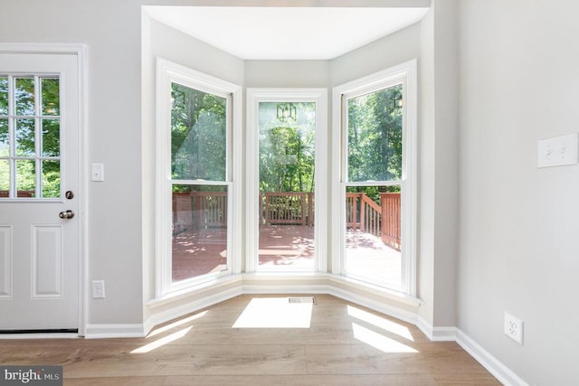 5907 Cambridge Dr, Fredericksburg, VA 22407 - doorway to outside featuring baseboards and wood finished floors