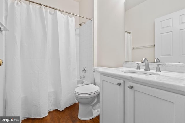 5910 Carnifex Ferry Rd W, Fredericksburg, VA 22407 - bathroom with toilet, vanity, shower / bath combo, and wood finished floors