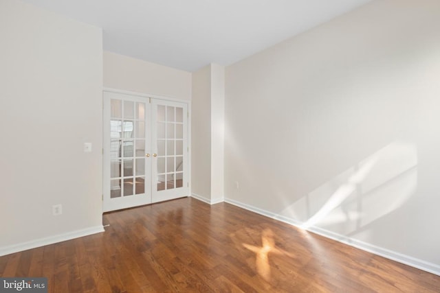 5910 Carnifex Ferry Rd W, Fredericksburg, VA 22407 - spare room with french doors, baseboards, and wood finished floors