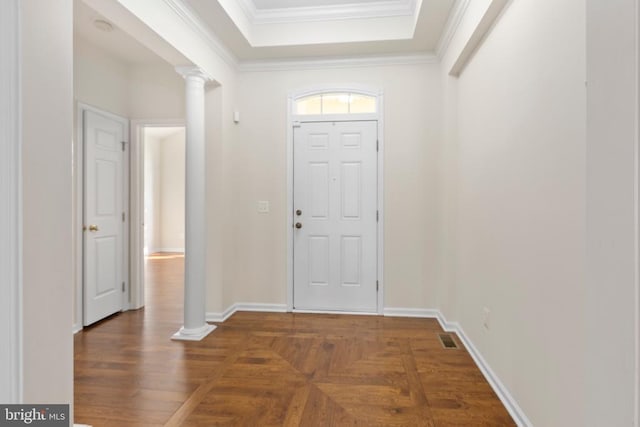 5910 Carnifex Ferry Rd W, Fredericksburg, VA 22407 - entryway with decorative columns, crown molding, a tray ceiling, and baseboards