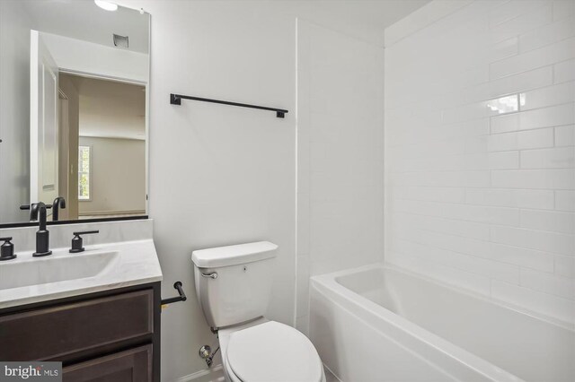  - full bathroom with toilet and vanity