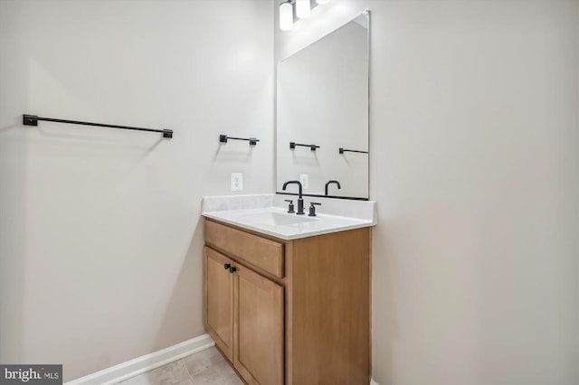  - bathroom featuring vanity and baseboards