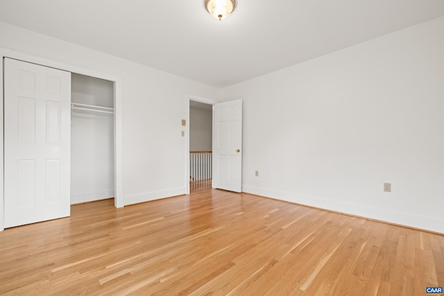 7928 Howardsville Rd, Scottsville, VA 24562 - unfurnished bedroom featuring light wood-style floors and a closet