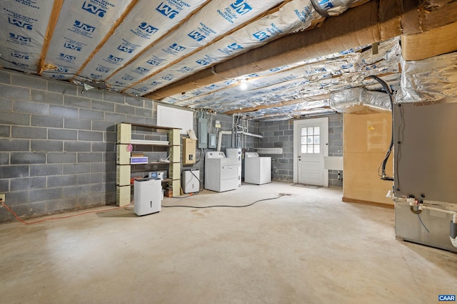 7928 Howardsville Rd, Scottsville, VA 24562 - basement with separate washer and dryer, heating unit, concrete block wall, and water heater
