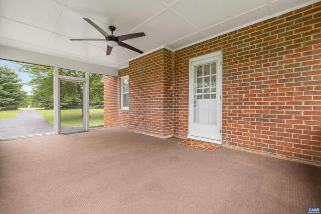 7928 Howardsville Rd, Scottsville, VA 24562 - unfurnished sunroom with a ceiling fan