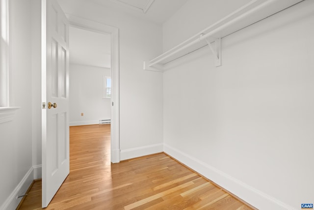 7928 Howardsville Rd, Scottsville, VA 24562 - spacious closet featuring light wood finished floors and a baseboard heating unit