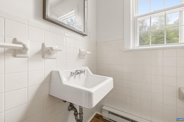 7928 Howardsville Rd, Scottsville, VA 24562 - bathroom with healthy amount of natural light, tile walls, and baseboard heating