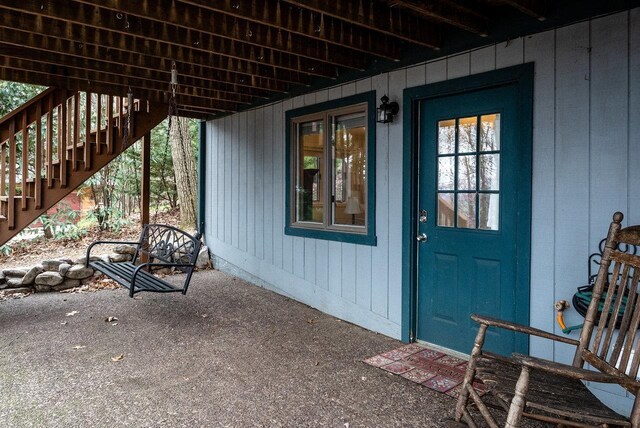 doorway to property featuring a patio area