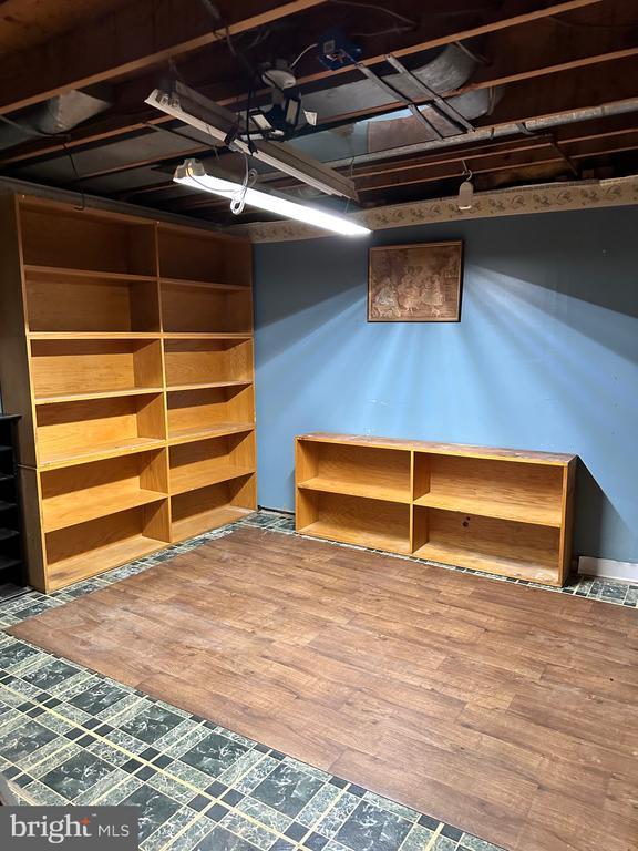 basement with wood finished floors