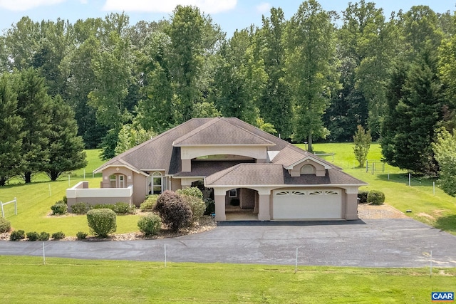 408 Kent Ln, Kents Store, VA 23084 - view of front of property with driveway, an attached garage, stucco siding, and roof with shingles