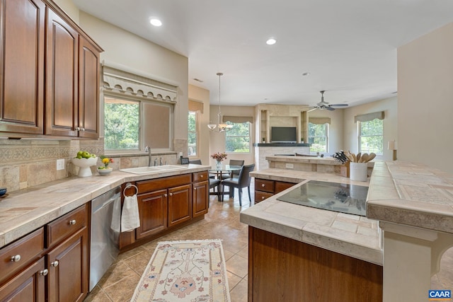 408 Kent Ln, Kents Store, VA 23084 - kitchen with dishwasher, decorative backsplash, black electric cooktop, ceiling fan, and open floor plan