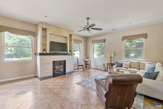 408 Kent Ln, Kents Store, VA 23084 - living room with a ceiling fan, a stone fireplace, light tile patterned floors, and recessed lighting