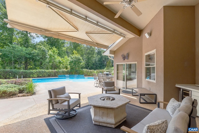 408 Kent Ln, Kents Store, VA 23084 - view of patio with a ceiling fan, an outdoor living space with a fire pit, and view of wooded area