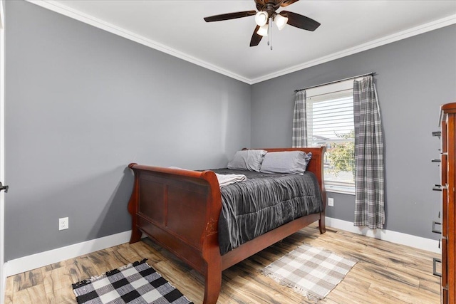 845 Forrest Dr, Stanley, VA 22851 - bedroom featuring ornamental molding, baseboards, a ceiling fan, and wood finished floors