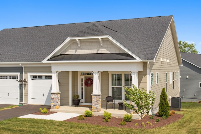2910 Rutlege Rd Unit 175, Rockingham, VA 22801 - craftsman inspired home featuring covered porch, roof with shingles, central AC, driveway, and an attached garage