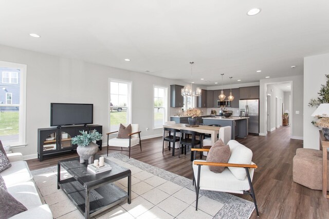 2910 Rutlege Rd Unit 175, Rockingham, VA 22801 - living room with a chandelier, recessed lighting, dark wood-style flooring, and baseboards