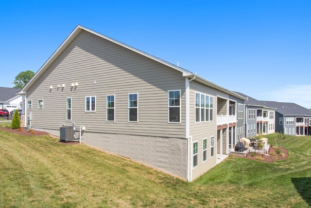 2910 Rutlege Rd Unit 175, Rockingham, VA 22801 - rear view of property with central AC unit and a lawn