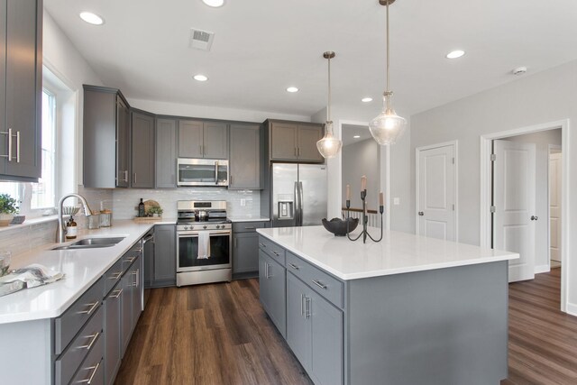 2910 Rutlege Rd Unit 175, Rockingham, VA 22801 - kitchen featuring stainless steel appliances, gray cabinets, a sink, dark wood finished floors, and recessed lighting