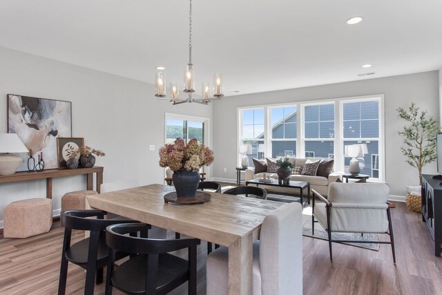 2910 Rutlege Rd Unit 175, Rockingham, VA 22801 - dining space featuring wood finished floors, a chandelier, recessed lighting, and baseboards