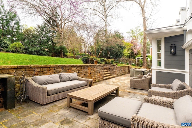 view of patio featuring a fenced backyard and outdoor lounge area
