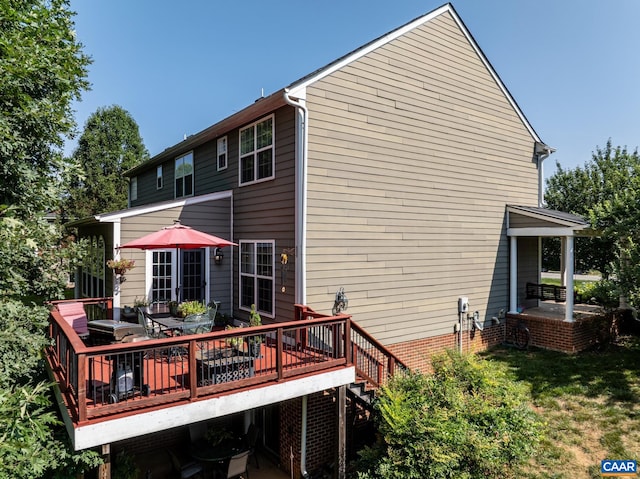 2 Forest Ct, Zion Crossroads, VA 22942 - back of property with a wooden deck and outdoor dining area