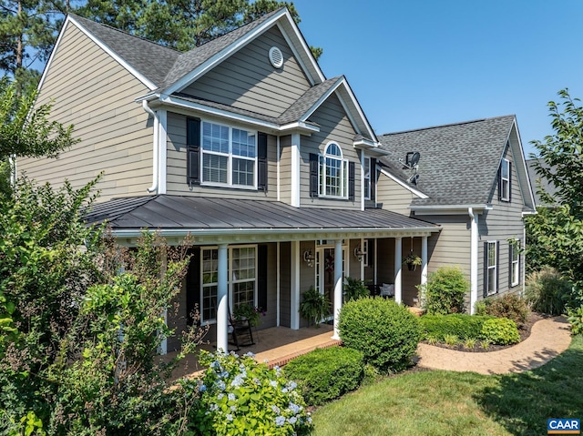 2 Forest Ct, Zion Crossroads, VA 22942 - view of front facade with covered porch, a shingled roof, a standing seam roof, and a metal roof