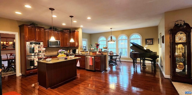 2 Forest Ct, Zion Crossroads, VA 22942 - kitchen featuring appliances with stainless steel finishes, a peninsula, recessed lighting, a chandelier, and decorative backsplash