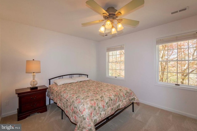 11523 Red Rock Ln, Bumpass, VA 23024 - carpeted bedroom with baseboards and a ceiling fan