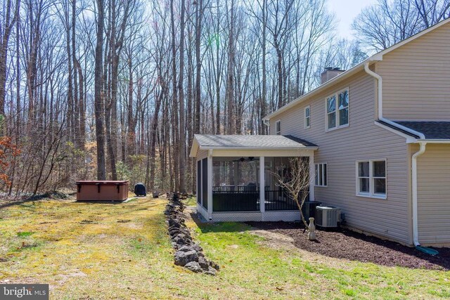 11523 Red Rock Ln, Bumpass, VA 23024 - view of green lawn featuring a sunroom