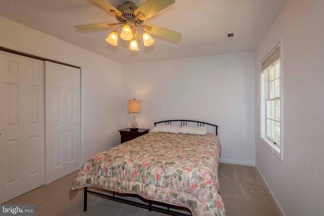 11523 Red Rock Ln, Bumpass, VA 23024 - bedroom with carpet floors, a closet, and ceiling fan