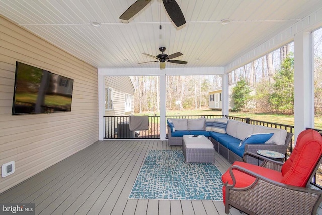 11523 Red Rock Ln, Bumpass, VA 23024 - wooden deck with an outdoor hangout area and a ceiling fan