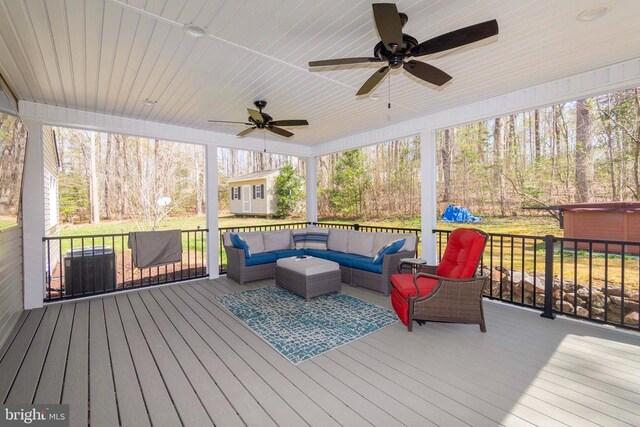 11523 Red Rock Ln, Bumpass, VA 23024 - deck featuring an outdoor hangout area, ceiling fan, and a storage unit