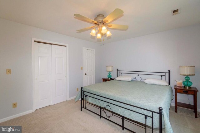 11523 Red Rock Ln, Bumpass, VA 23024 - bedroom featuring light carpet and a ceiling fan