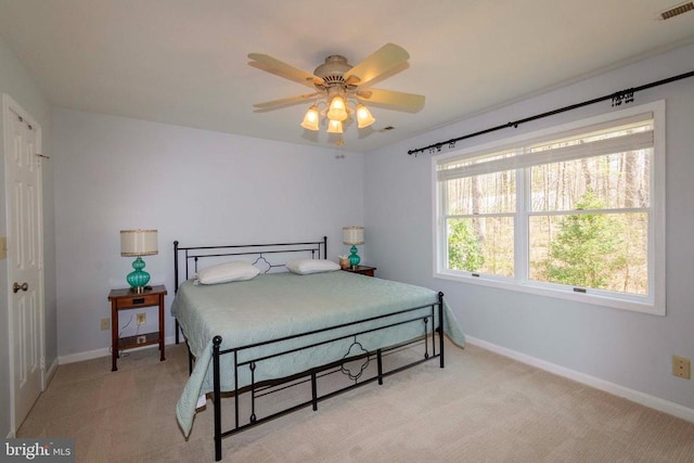 11523 Red Rock Ln, Bumpass, VA 23024 - bedroom with light colored carpet and ceiling fan