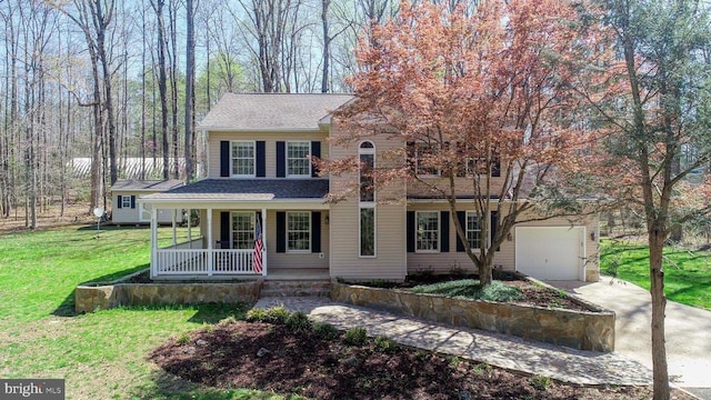 11523 Red Rock Ln, Bumpass, VA 23024 - colonial-style house with a porch, concrete driveway, a front lawn, a garage, and a shingled roof