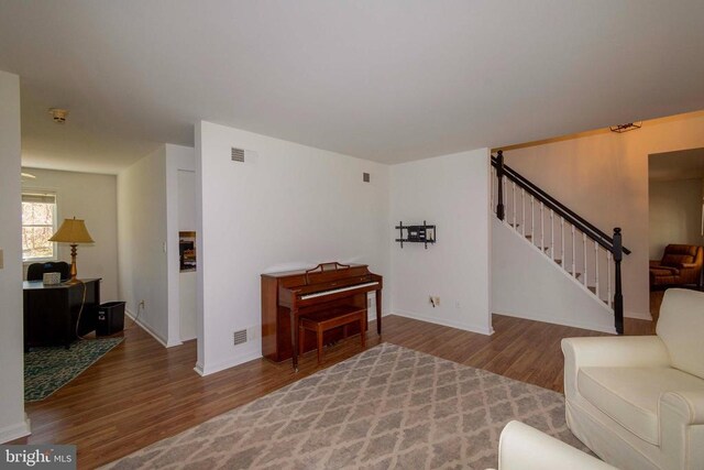 11523 Red Rock Ln, Bumpass, VA 23024 - living area featuring wood finished floors and stairway