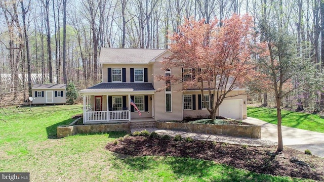 11523 Red Rock Ln, Bumpass, VA 23024 - view of front of property with covered porch, a front yard, concrete driveway, and roof with shingles