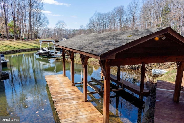 11523 Red Rock Ln, Bumpass, VA 23024 - dock with boat lift and a water view