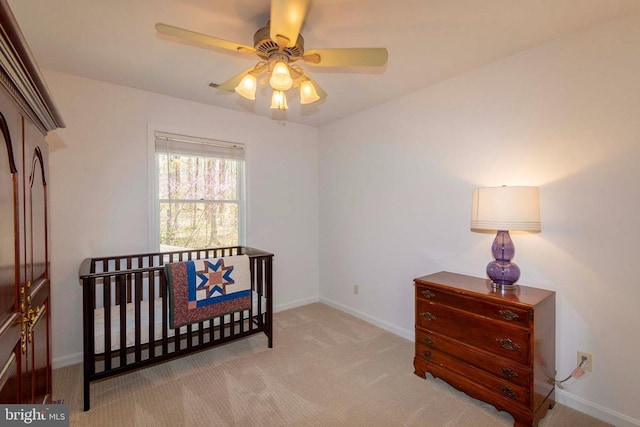 11523 Red Rock Ln, Bumpass, VA 23024 - carpeted bedroom with a ceiling fan and a crib