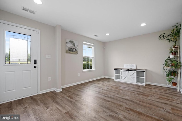  - entryway featuring wood finished floors, baseboards, and recessed lighting