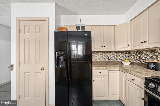 13104 Willow Point Dr, Fredericksburg, VA 22408 - kitchen with black refrigerator with ice dispenser, tile patterned floors, decorative backsplash, a textured ceiling, and range with gas stovetop