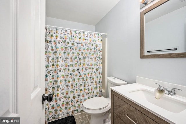 13104 Willow Point Dr, Fredericksburg, VA 22408 - bathroom with a shower with shower curtain, toilet, vanity, and tile patterned floors