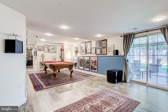 game room featuring billiards table, wood finished floors, and baseboards